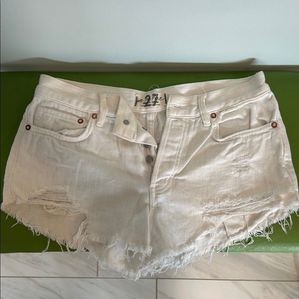 We The Free Cream Distressed Cutoff Denim Shorts